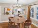 Charming dining room boasting hardwood floors and easy access to the adjacent kitchen at 4345 Guilford Ave, Indianapolis, IN 46205