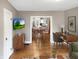 View of the living space showcasing an open floor plan leading to the dining room and kitchen at 4345 Guilford Ave, Indianapolis, IN 46205