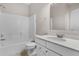 Clean bathroom featuring a shower and tub combo and a granite countertop sink at 4539 Maldenhair Dr, Indianapolis, IN 46239