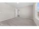 Neutral carpeted bedroom features doorways with an open floor plan at 4539 Maldenhair Dr, Indianapolis, IN 46239