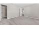 Neutral carpeted bedroom features multiple doorways to offer convenience at 4539 Maldenhair Dr, Indianapolis, IN 46239