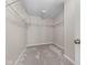 Walk-in closet with shelving and carpet floor offers ample storage space at 4539 Maldenhair Dr, Indianapolis, IN 46239