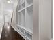 Hallway featuring a custom built-in mudroom with ample storage and access to the kitchen at 4539 Maldenhair Dr, Indianapolis, IN 46239