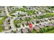 Expansive aerial view of a suburban neighborhood featuring well-maintained homes and green spaces, highlighting community living at 4683 W Lawrence Way, New Palestine, IN 46163