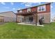 The backyard boasts a lovely patio with a pergola, providing a perfect spot for relaxation and entertainment at 4683 W Lawrence Way, New Palestine, IN 46163