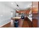 This kitchen features wood cabinets, stainless steel appliances, and a center island at 4683 W Lawrence Way, New Palestine, IN 46163