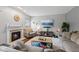 This living room features a fireplace, television, and comfortable seating with a neutral color scheme at 4683 W Lawrence Way, New Palestine, IN 46163