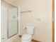 Bathroom featuring a glass shower, toilet, tile flooring, and vanity with drawers at 4725 W Harrisburg Ct, New Palestine, IN 46163
