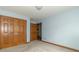 Bedroom with carpet flooring, neutral paint and large closet space at 4725 W Harrisburg Ct, New Palestine, IN 46163