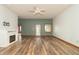 Open and bright living room with views to other rooms and natural light at 4725 W Harrisburg Ct, New Palestine, IN 46163
