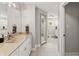 Bright bathroom featuring a walk-in shower with glass door and double sink vanity at 4808 Lakeview Dr, Greenwood, IN 46143