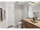 Bathroom featuring a glass shower, wood vanity, and modern fixtures and lighting at 4808 Lakeview Dr, Greenwood, IN 46143