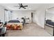 Serene bedroom with a large mirror, soft carpet, and a comfortable bed near the walk-in closet at 4808 Lakeview Dr, Greenwood, IN 46143