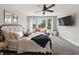 Comfortable bedroom with plenty of natural light, bed, and decorative pillows at 4808 Lakeview Dr, Greenwood, IN 46143