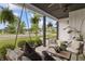Cozy covered porch featuring a swing, comfortable seating, and scenic views at 4808 Lakeview Dr, Greenwood, IN 46143