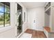 Entryway with a glass door, bench, and storage, providing practical solutions and style at 4808 Lakeview Dr, Greenwood, IN 46143