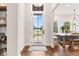 Elegant foyer with wood floors and a view of the lake at 4808 Lakeview Dr, Greenwood, IN 46143