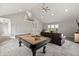 Large game room featuring a pool table, and a comfortable seating area at 4808 Lakeview Dr, Greenwood, IN 46143