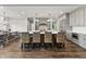 Spacious kitchen features a large island with seating and stainless steel appliances at 4808 Lakeview Dr, Greenwood, IN 46143