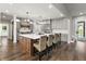 Gourmet kitchen features a large island, stainless appliances, and pendant lighting at 4808 Lakeview Dr, Greenwood, IN 46143