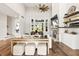 Inviting living area with high ceilings, a fireplace, and chic furniture arrangement at 4808 Lakeview Dr, Greenwood, IN 46143