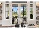 Close-up of a glass patio door in the living room, looking out to a beautiful outdoor view at 4808 Lakeview Dr, Greenwood, IN 46143