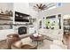 Charming living room with high ceilings, stone fireplace and well-placed decorations at 4808 Lakeview Dr, Greenwood, IN 46143