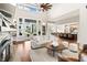 Open-concept living room with access to outdoor patio and adjacent dining area at 4808 Lakeview Dr, Greenwood, IN 46143