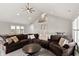 Spacious living room with a comfortable brown sectional sofa and ladder to loft play area at 4808 Lakeview Dr, Greenwood, IN 46143