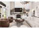 Cozy living room features a stone fireplace and well-placed shelving and decorations at 4808 Lakeview Dr, Greenwood, IN 46143