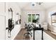 Bright office with guitar display, ample natural light and a dark wood desk at 4808 Lakeview Dr, Greenwood, IN 46143