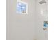 Bright shower featuring white subway tile and a window for natural light at 4808 Lakeview Dr, Greenwood, IN 46143