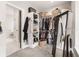 Spacious walk-in closet with ample storage, shelving, and a mirror at 4808 Lakeview Dr, Greenwood, IN 46143