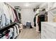 Organized walk-in closet with shelves, hanging rods, and storage solutions at 4808 Lakeview Dr, Greenwood, IN 46143