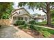 Attractive home with a covered front porch, neat landscaping, and a welcoming walkway at 4818 Winthrop Ave, Indianapolis, IN 46205