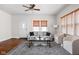 Inviting living room featuring stylish furniture, hardwood floors, and ample natural light at 4818 Winthrop Ave, Indianapolis, IN 46205
