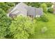 Aerial view of a residential house surrounded by lush greenery at 4949 Jennings Dr, Carmel, IN 46033