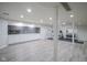 Finished basement offers open space, recessed lighting, and includes an exercise area at 4949 Jennings Dr, Carmel, IN 46033