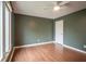 Bedroom featuring hardwood floors, natural light, and neutral color walls at 4949 Jennings Dr, Carmel, IN 46033