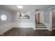 Dining room with a window view to the kitchen, plus stairway access at 4949 Jennings Dr, Carmel, IN 46033