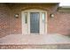 Welcoming front entrance with brick walkway and classic architectural details at 4949 Jennings Dr, Carmel, IN 46033