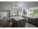 Spacious kitchen features an island, stainless steel appliances, bar seating, and open layout at 4949 Jennings Dr, Carmel, IN 46033