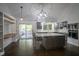 Open kitchen features an island with seating, modern appliances, and plenty of storage at 4949 Jennings Dr, Carmel, IN 46033