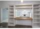 Spacious living room has a built-in bookshelf with open view to a second living space at 4949 Jennings Dr, Carmel, IN 46033