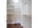 Walk-in closet with built-in shelving, providing ample storage solutions at 4949 Jennings Dr, Carmel, IN 46033