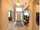 Bright foyer with tile flooring, open layout, and a view of the adjacent rooms at 5010 Cabrillo Dr, Plainfield, IN 46168