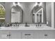 Elegant bathroom features dual sinks, modern fixtures, and a well-lit vanity at 5558 Spicebush Dr, Indianapolis, IN 46254