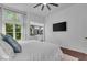 Inviting primary bedroom with a view to the ensuite bathroom and serene outdoor scenery at 5558 Spicebush Dr, Indianapolis, IN 46254