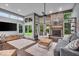 Bright living room boasts backyard access, fireplace, and neutral tones at 5558 Spicebush Dr, Indianapolis, IN 46254