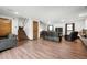 Finished basement with wood flooring, a fireplace, and a comfortable seating area at 5631 N Olivia Dr, Alexandria, IN 46001